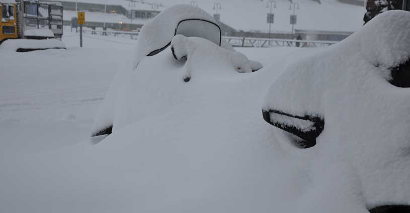 Buried Skidoo in Fresh Snow